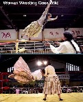 Woman wrestler flies